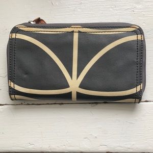 Orla Kiely wallet, black with beige pattern. Orange interior.